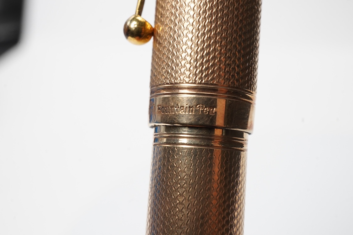 A large Waterman fully covered gold filled fountain pen, lever filler, in fine barley pattern - No.2 Waterman nib